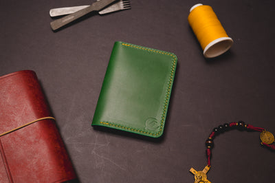 Green Buttero full grain leather card wallet with yellow stitching — The Morgan by Dark Sky Leather