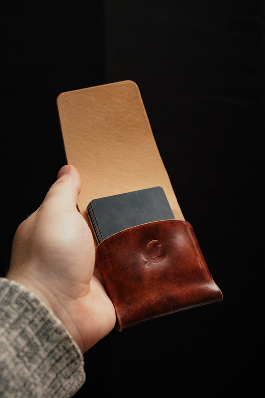 Interior view of Paulie Shell Cordovan bifold wallet showing card slots and cash compartment