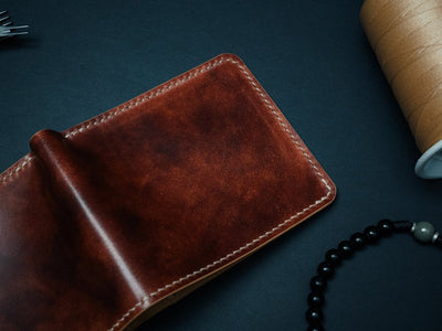 Museum Cognac shell cordovan bifold wallet — The Dillon, hand-stitched by Dark Sky Leather (detail view)