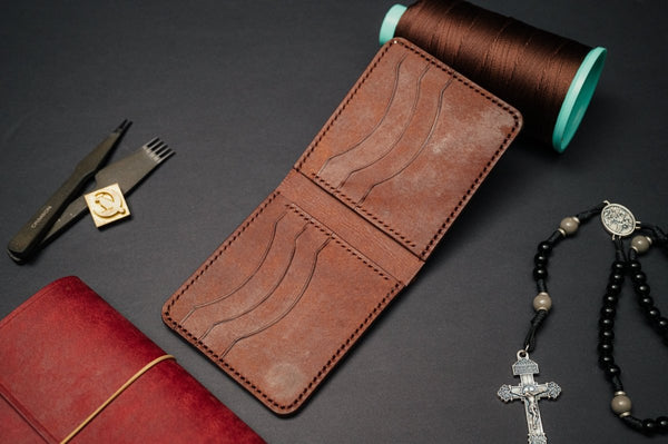 The Dillon full grain leather bifold wallet, handmade by Dark Sky Leather